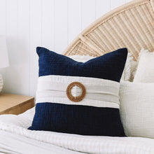 Load image into Gallery viewer, Hamptons coastal cushion with navy blue cover and natural colour detail and rattan buckle. Blue cushion covers 50x50 - Square cushion
